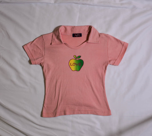 Pastel Orange Polo with Apple Graphic